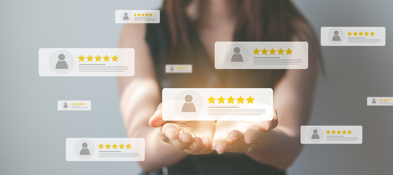 The image shows a person s hand reaching towards a digital interface with various icons and star ratings, suggesting a theme of reviews, ratings, or customer feedback.